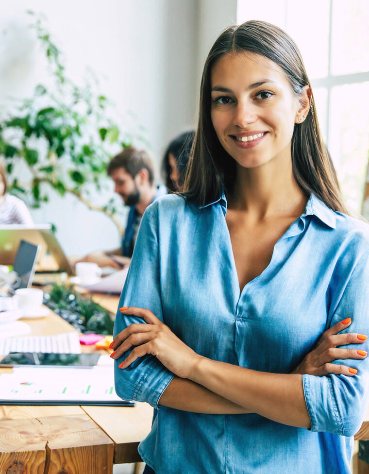 Attractive confident modern business woman in casual clothes loo